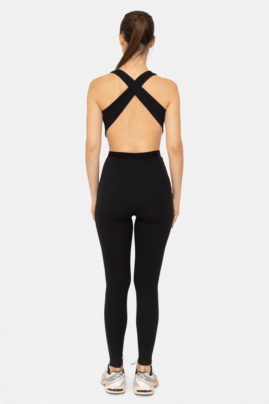 Sculpted Sophistication: Sculpt & Flow V-Neck Cutout Jumpsuit